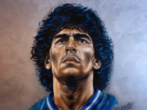 Detalle del rostro en el retrato mural realista de Maradona