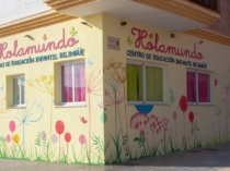 Mural-pintado-a-mano-en-fachada-de-escuela
